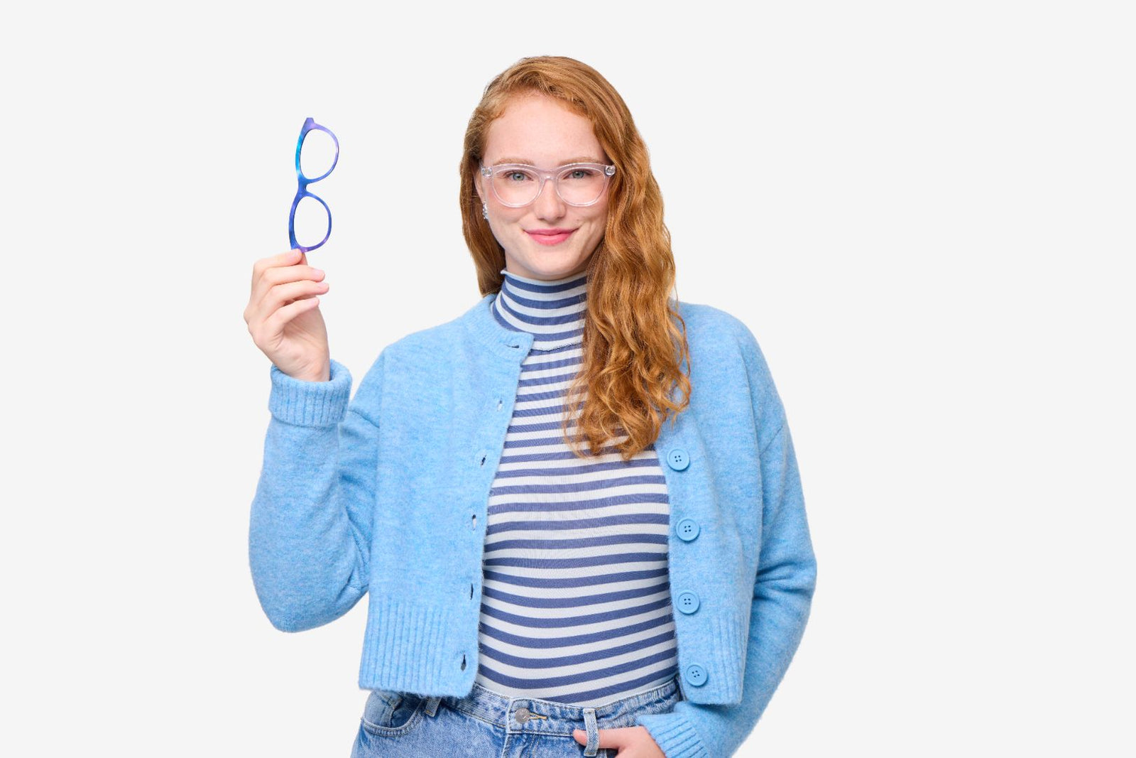 Normal eye axis: woman holding 2 pairs of glasses