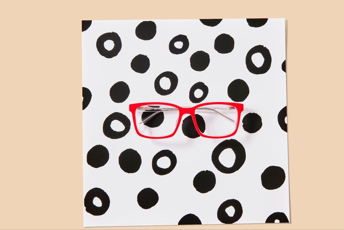 Parts of eyeglasses: a pair of red eyeglasses