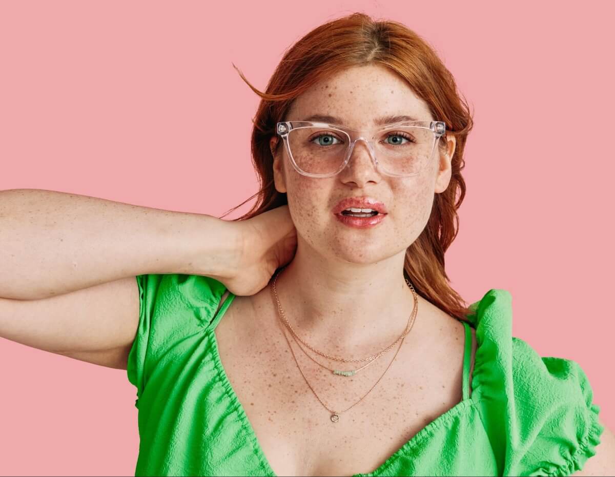 Close up shot of a woman wearing a pair of cat eye glasses