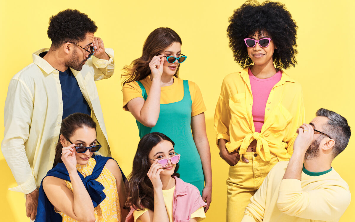 Group of friends wearing beach sunglasses
