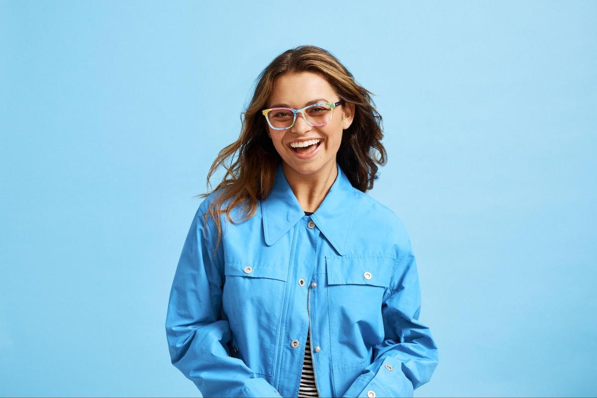 60s style glasses: woman smiling at the camera