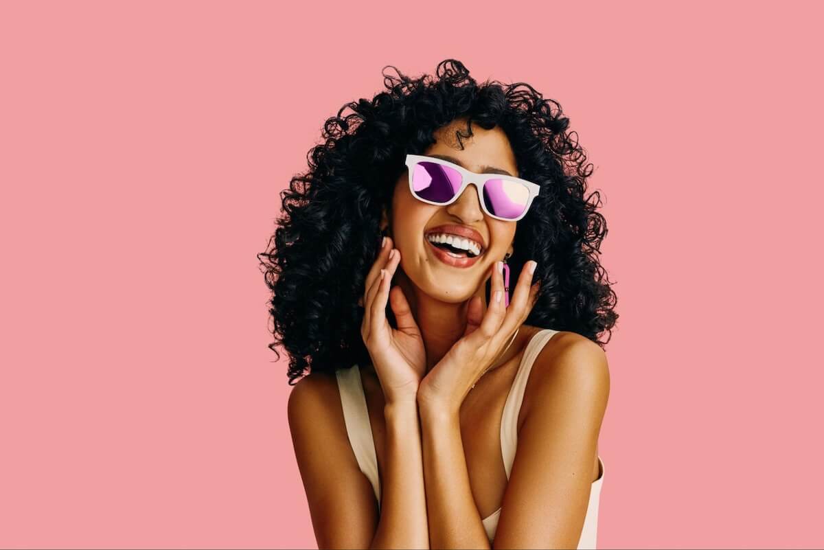 Woman wearing a pair of progressive sunglasses