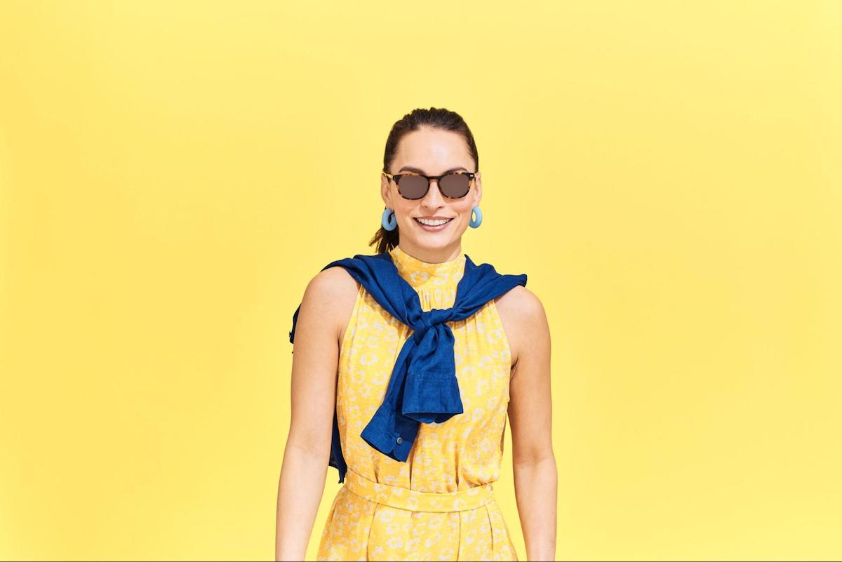 Woman wearing a pair of vintage style sunglasses
