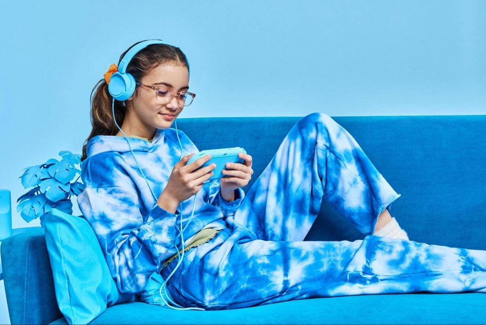Gamer glasses: girl playing a video game