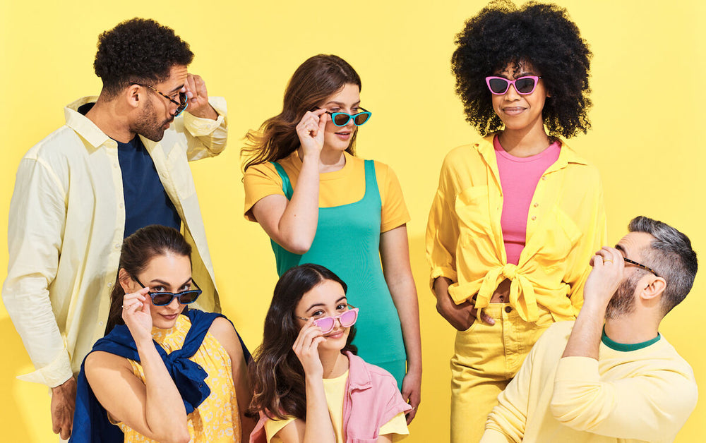 Group of friends wearing beach sunglasses