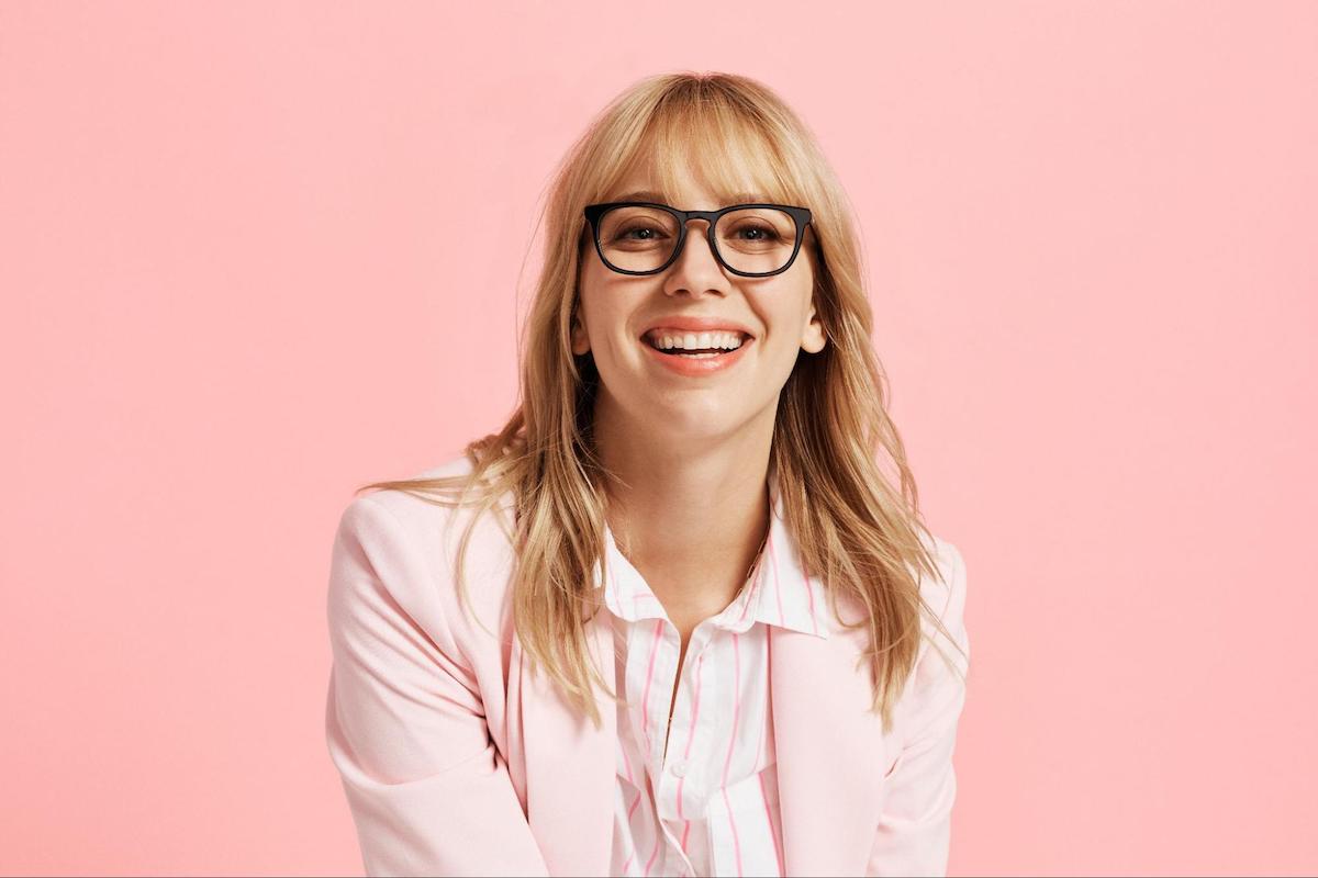 Bifocal lens: woman wearing a pair of eyeglasses and smiling at the camera
